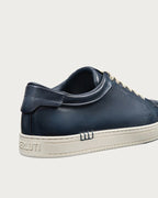 Berluti Playtime sneakers feature navy blue Venezia leather and signature hand