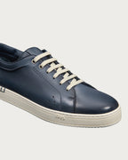 Berluti Playtime sneakers feature navy blue Venezia leather and signature hand